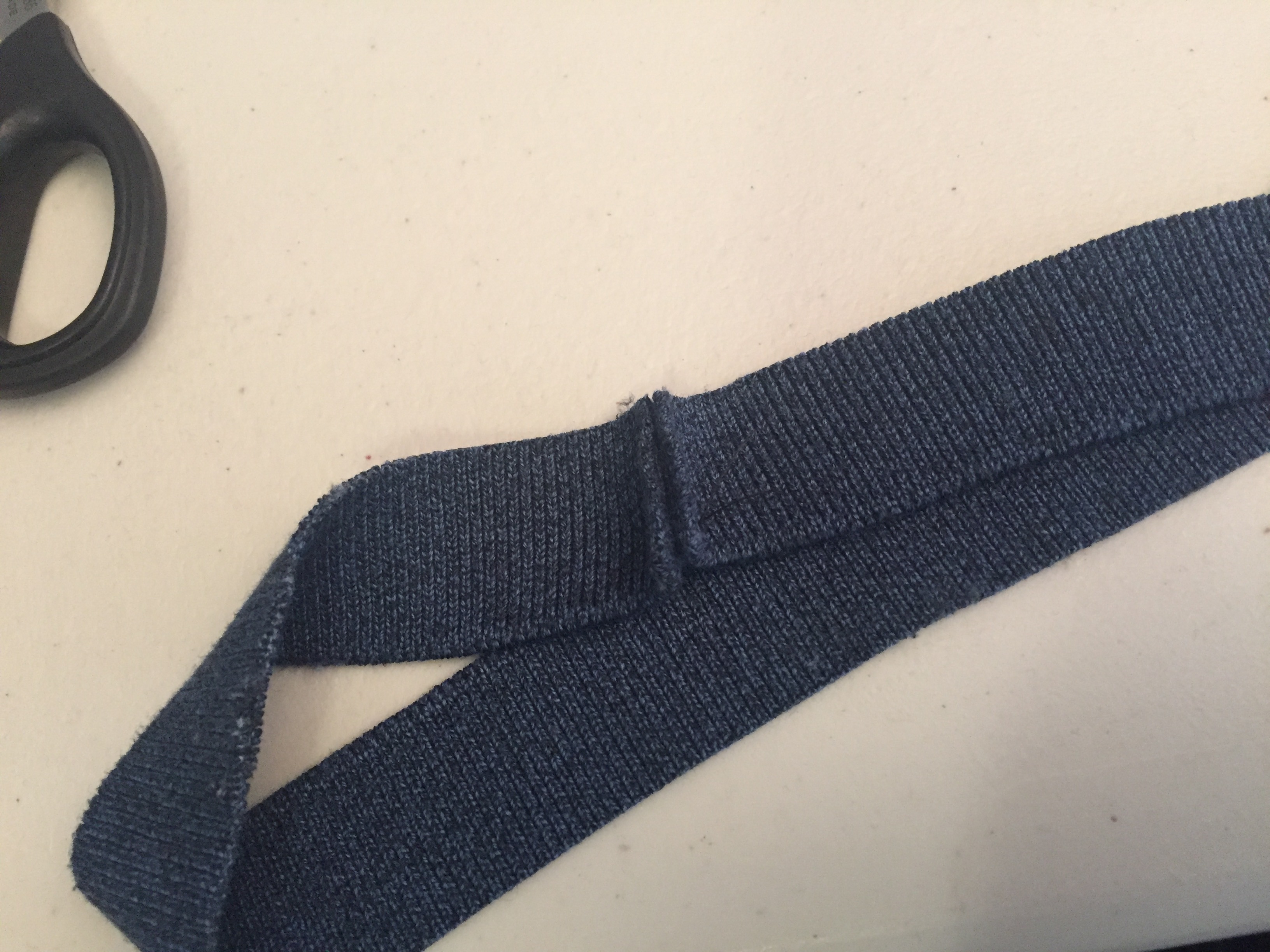 Neck band ends sewn together